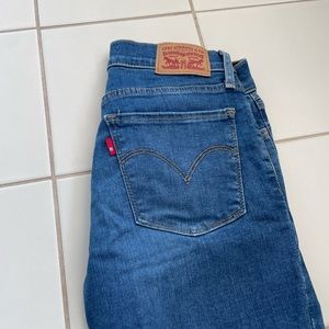LEVI’S 710 high waisted ripped skinny jeans